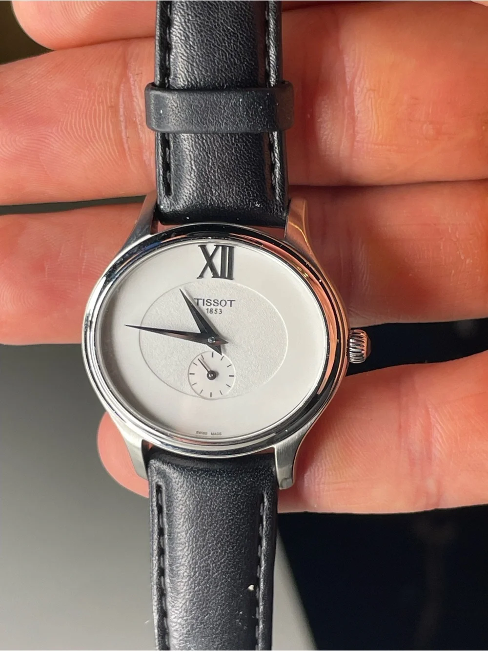 Tissot Bella Ora Ladies Black Leather Strap Silver Case White Dial Watch